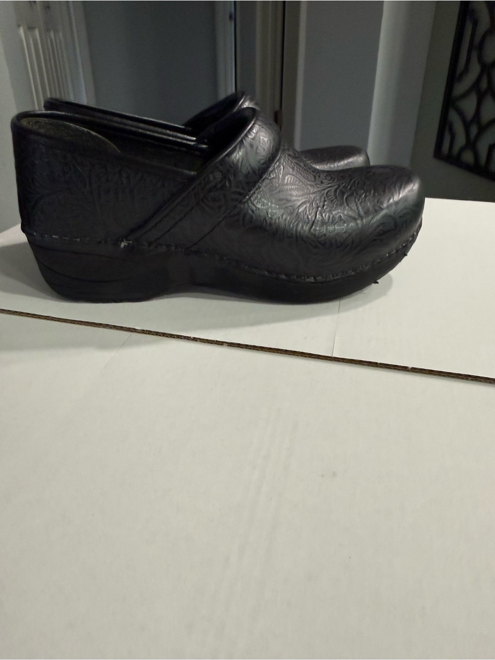 Dansko Black Embossed Leather Slip-On Clog